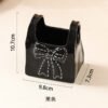 O1CN01BUEF3j1fsuIY6B063_2218038184063-0-cib Bow-Shaped Ceramic Desktop Pen Holder & Storage Box