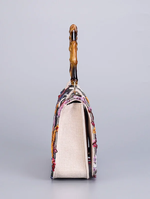 O1CN011epEH91cfDf6G0wpD_2209246163627-0-cib.jpg_ 2025 New Embroidered Sequin Handbag with Bamboo Handle, Women's Niche High-End Fashion Bag
