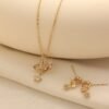 Copper Inlaid Zircon Meteor Shower Necklace Geometric Star Pendant Earrings Set