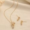 Copper Inlaid Zircon Meteor Shower Necklace Geometric Star Pendant Earrings Set