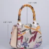 O1CN01v7TZIZ1cfDfAskQxG_2209246163627-0-cib.jpg_ 2025 New Embroidered Sequin Handbag with Bamboo Handle, Women's Niche High-End Fashion Bag