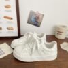 Small white shoes women 2025 spring new explosions niche shoes shell head board shoes students Joker casual sneaker