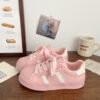 Small white shoes women 2025 spring new explosions niche shoes shell head board shoes students Joker casual sneaker